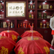 A woman works in a shop selling locally made baijiu in Maotai in China’s Guizhou province.